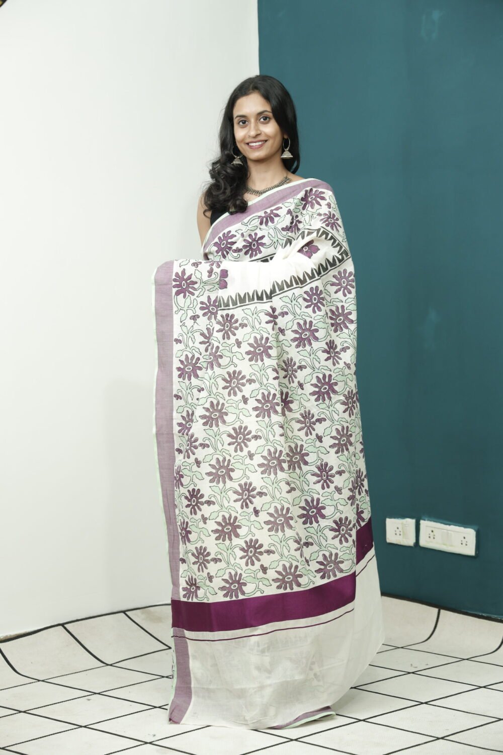 The Elegance of Kerala Sarees: Cream Base with Floral Block Print, Maroon Border, and White Kasavu - Image 2